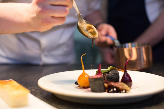 Hay smoked venison, salsify, potato, brown rice, red cabbage, beets at Auberge du Lac