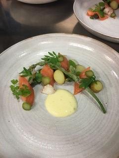 Lewis Sully's Confit trout, green strawberries, asparagus, jersey royals, champagne sabayon, hop shoot tempura 