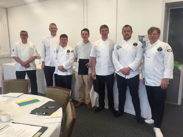 The kitchen judges are led by Chair of Examiners Russell Bateman
