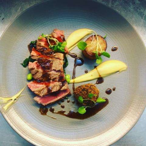Beef sirloin, celeriac, edamame, potato fondant, spinach and beef jus by chef Ray Yeung