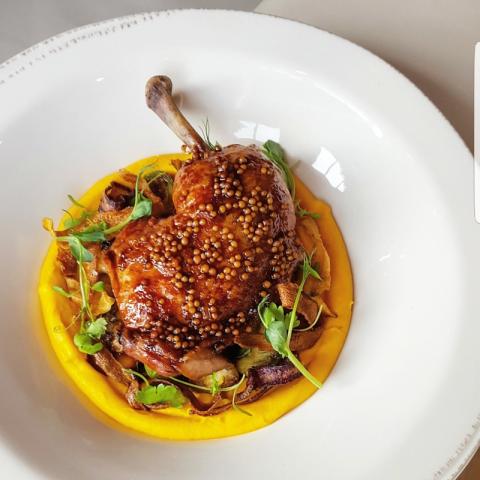 Slow roast chicken, mustard seed, carrot and ginger puree, herbs by Oli Harding