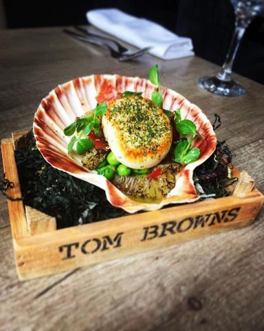 Seared scallop, peas, broad beans, capers, crispy ham, burnt lemon and gremolata by chef Scott Judson, The Staff Canteens most liked Instagram images, food pics