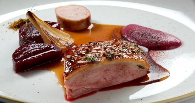 Duck with fermented cabbage and blackcurrant puree