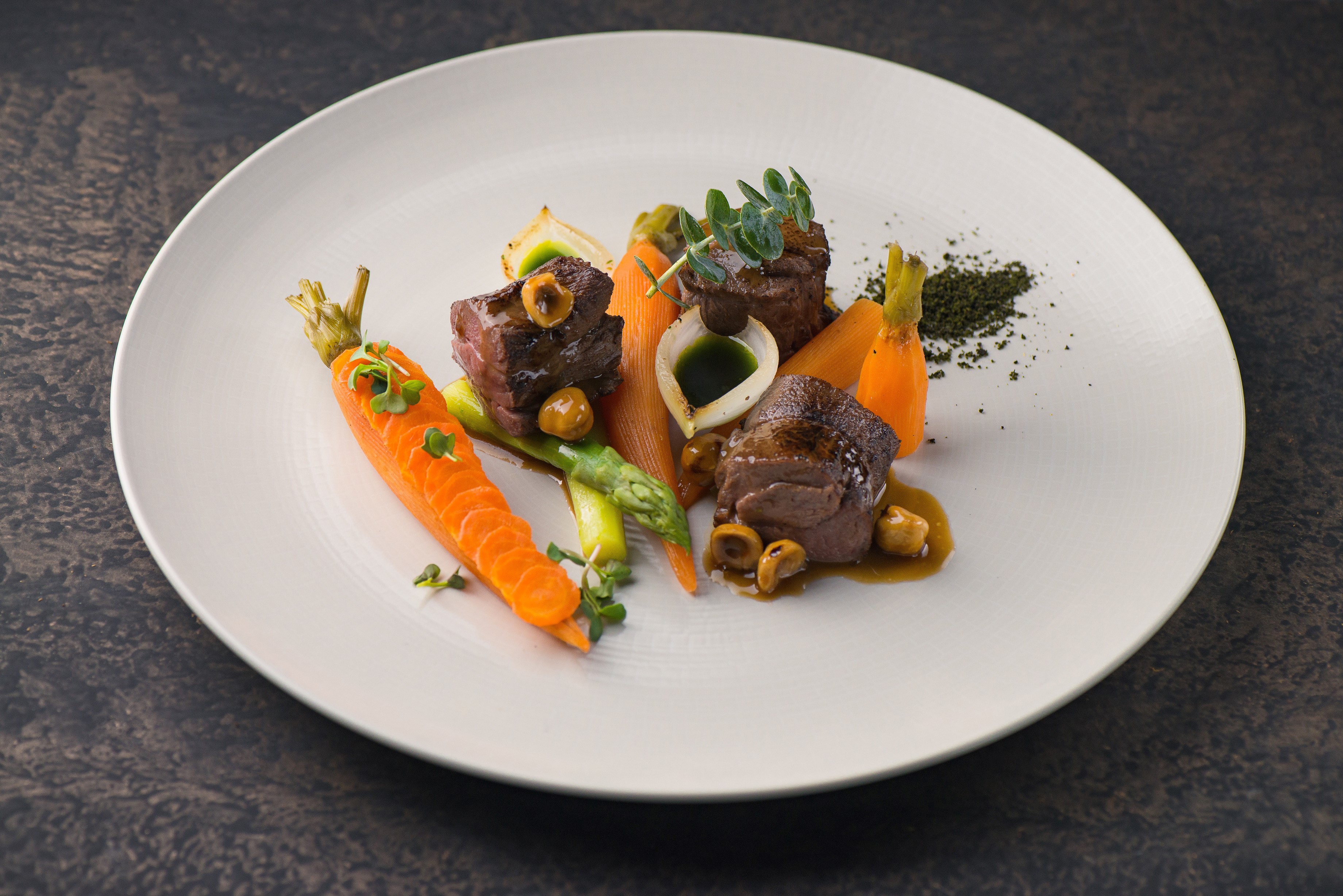 Lamb fillet with young vegetables%2C sauce hanzelnut