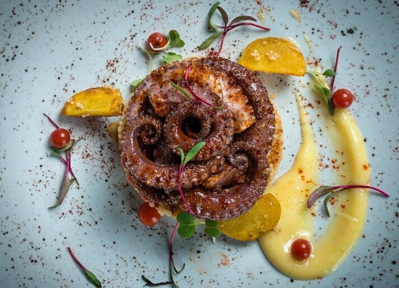 Grilled octopus, with paprika de la Vera and truffled oil with couscous criollas chips and bittersweet pearl tomatoes, garnished with smoked garlic alioli ???????? by Carlos Alvarez (@chefcarlosalvarez), chefs, food pics, chefs to follow, Instagram, The Staff Canteen⠀