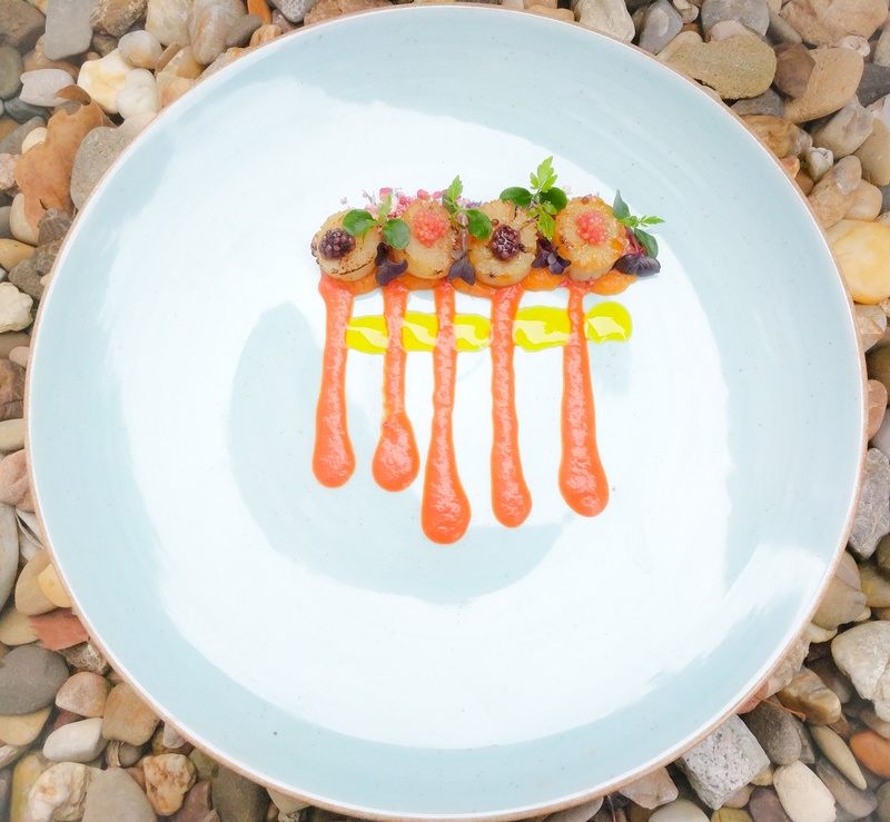 Seared baby scallops, pumpkin puree,red pepper coulis, raspberry seeded mustard,roe, saffron balsamic by chef John Subritzky