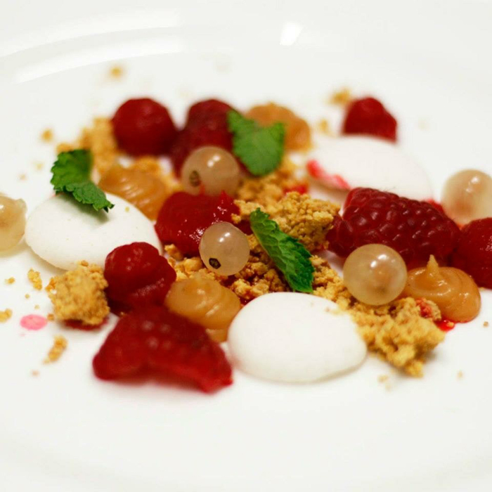 Malted marshmallow, fresh raspberries, raspberry gel, black pepper fudge, roast white chocolate, baby mint.