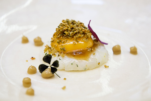 Squid Tartare with liquid egg yolk%2C onion and kaffir consommé   small 2